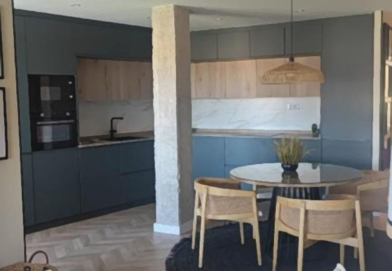 Ferienwohnung in Mogro - WintowinRentals Suite Miramar Apartment, Usil Beach